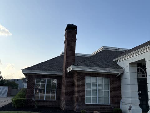 Building exterior with freshly mulched beds and edged lawn